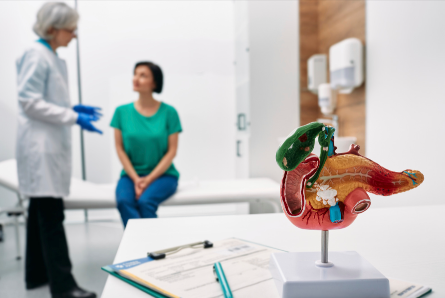 A doctor talking to a woman about gastroenterology.